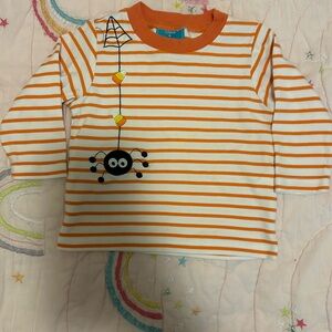 Claire and Charlie, orange and white long sleeve spider Halloween shirt